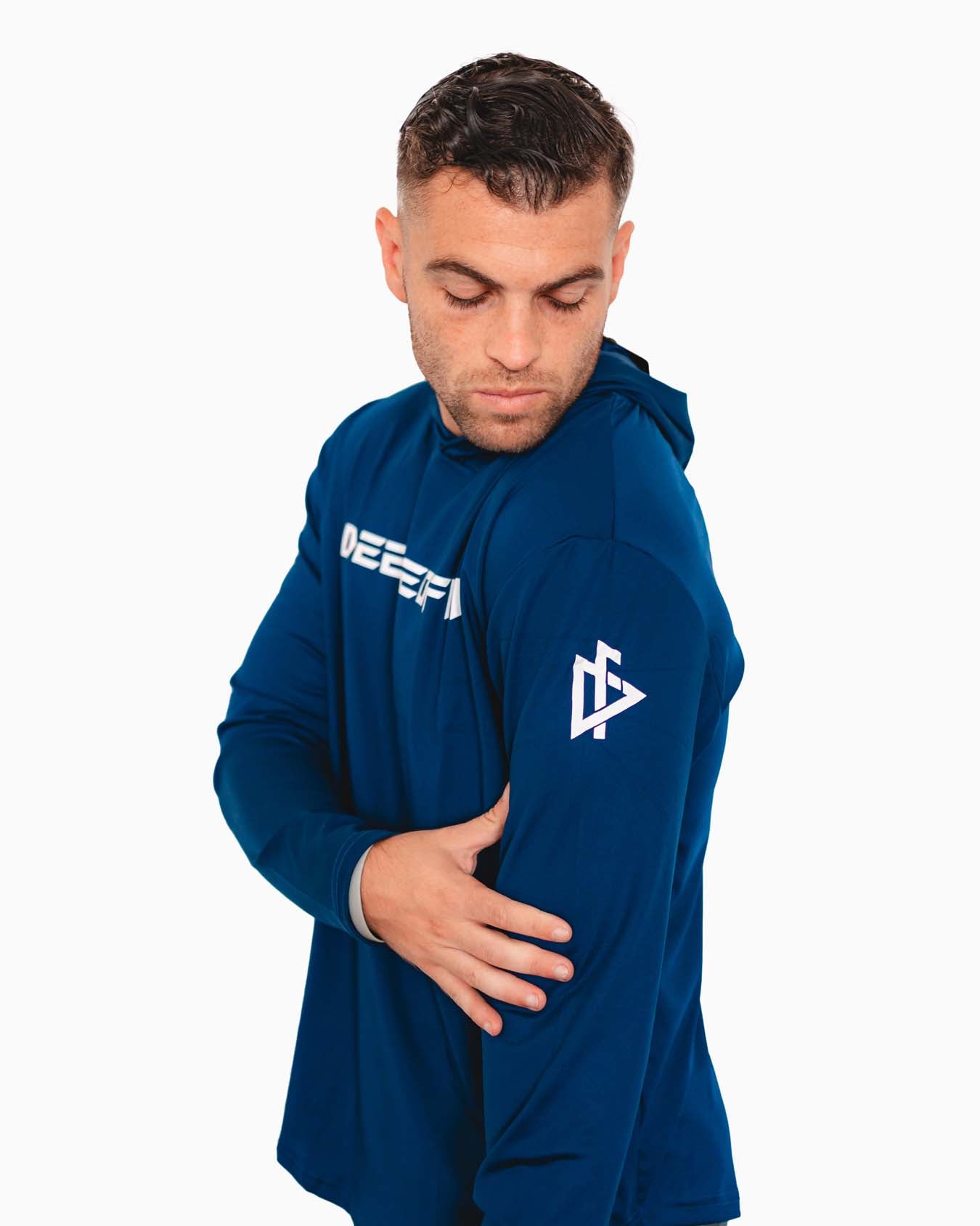 Side profile highlighting the hoodie’s ergonomic stitching.