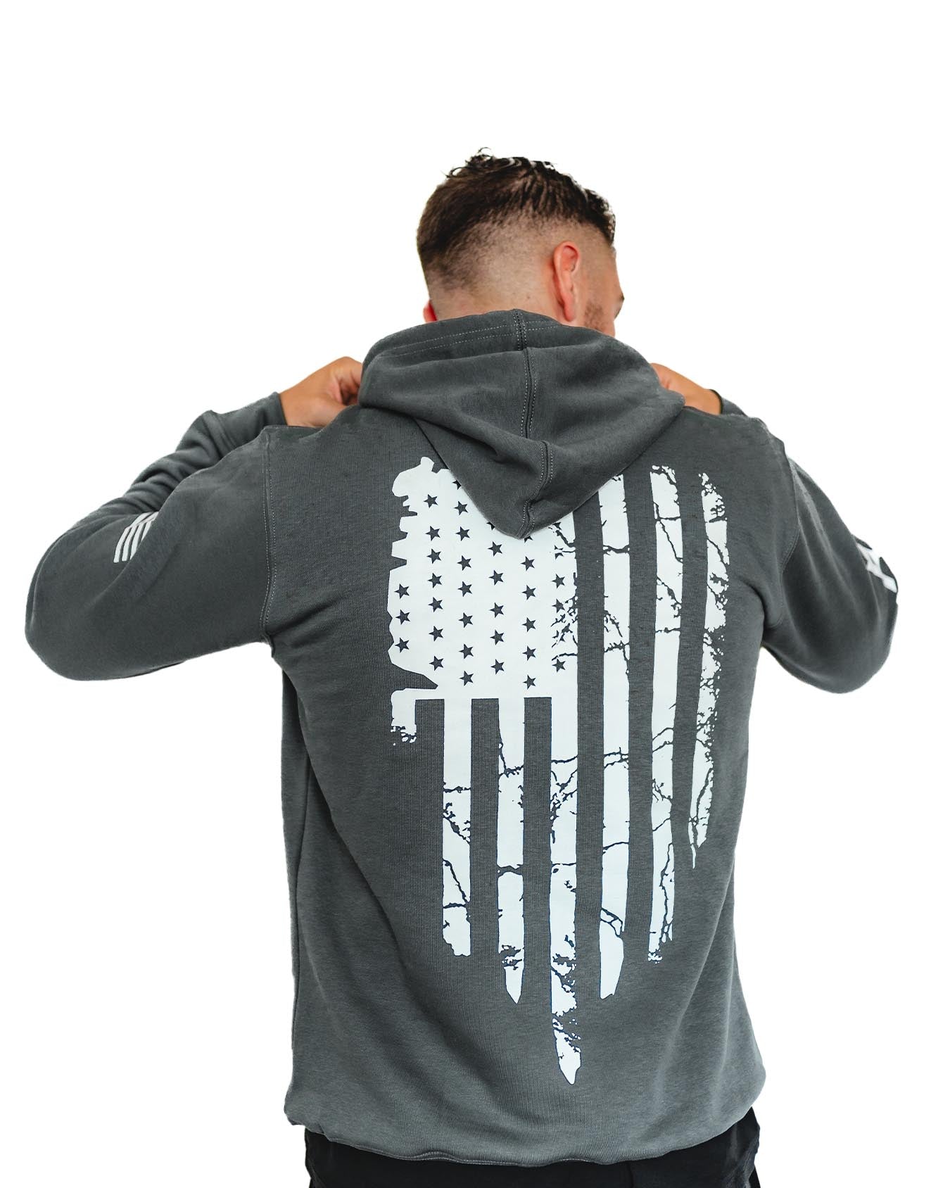 Back view of gray hoodie featuring bold stars and stripes flag design.