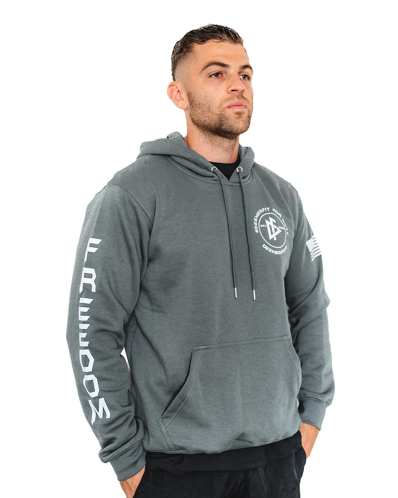 Close-up of hoodie arm showing 'Freedom' lettering and embroidered American flag.