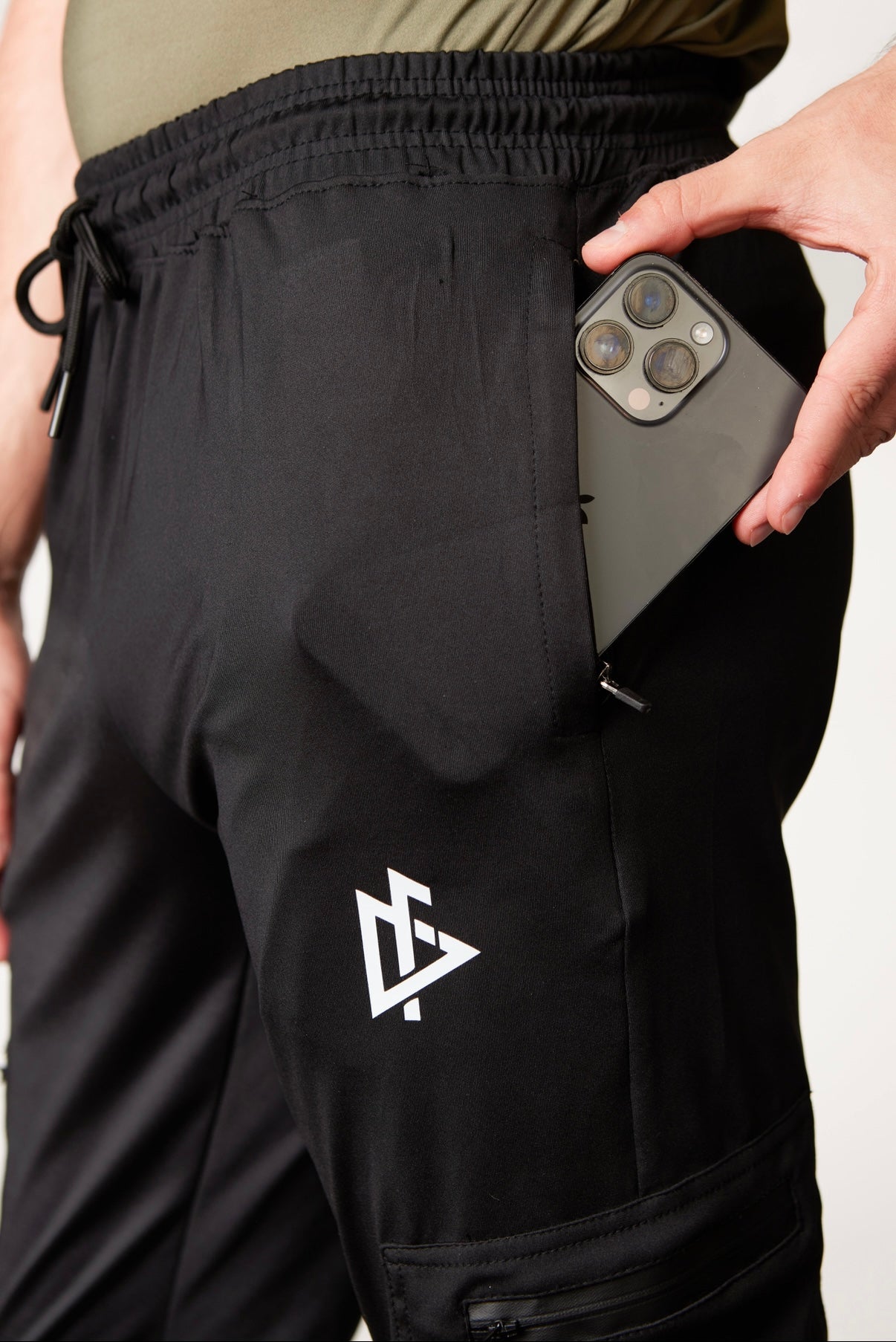 DeemedFit joggers displaying rear pocket detail and fitted ankle cuffs.