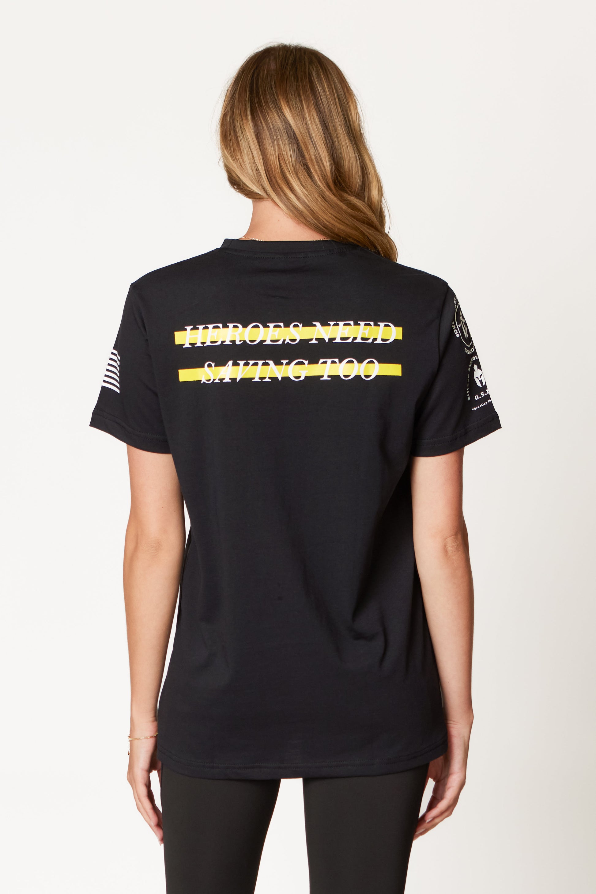Close-up of Gold Line tee design representing support for first responders and mental health awareness.