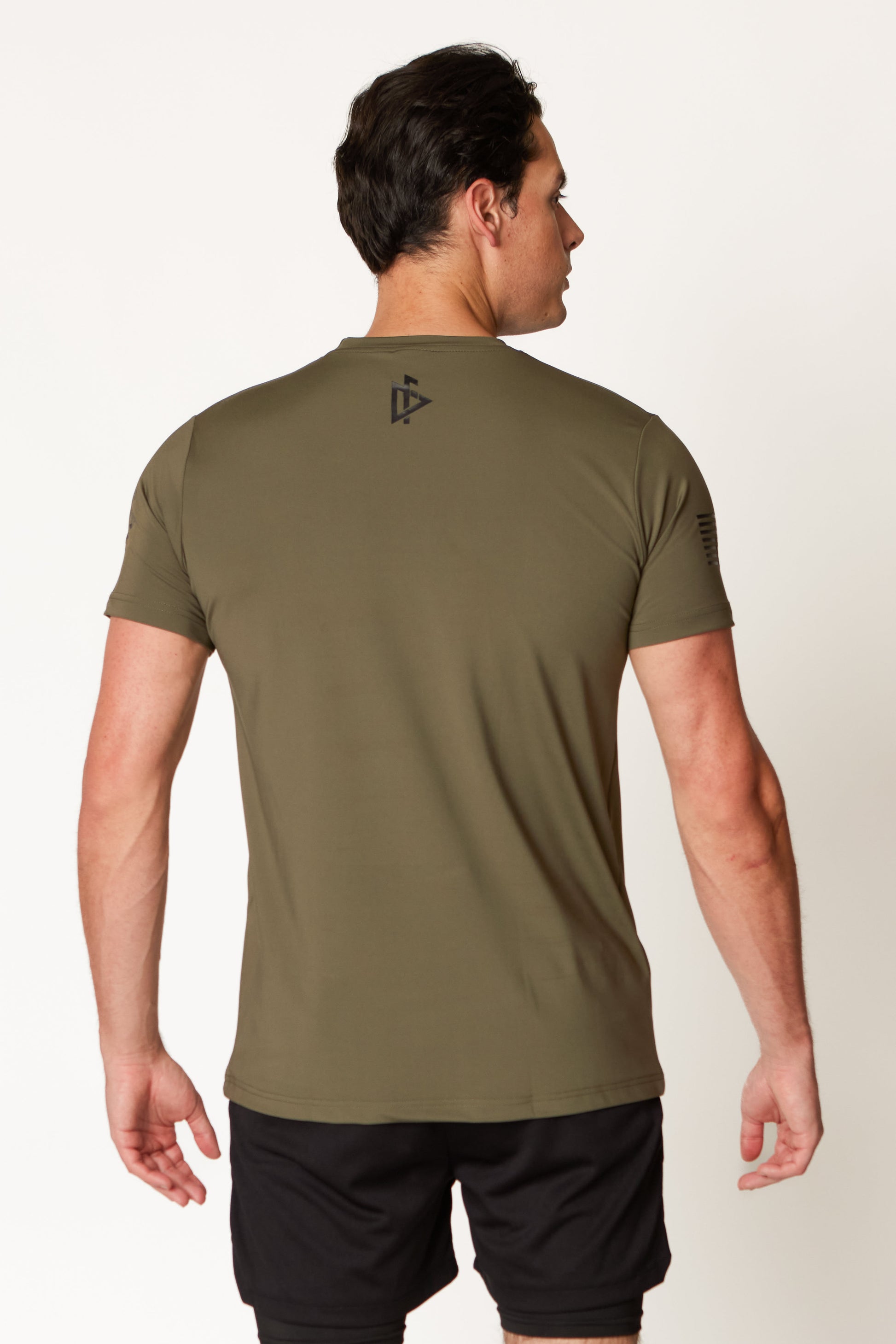 Back view of the olive DeemedFit Compellence tee showing muscle definition