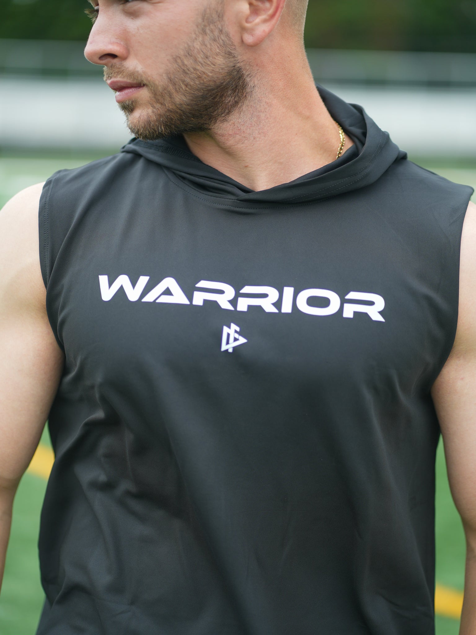 closeup of man in Sleeveless Black DeemedFit Warrior Hoodie