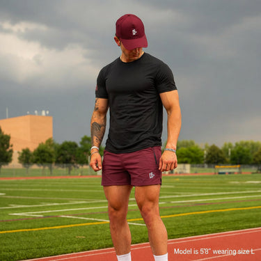 Man wearing Tactical Short in Red colorway, lifestyle shot