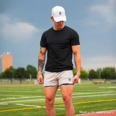 Man wearing Tactical Short in White colorway, lifestyle shot