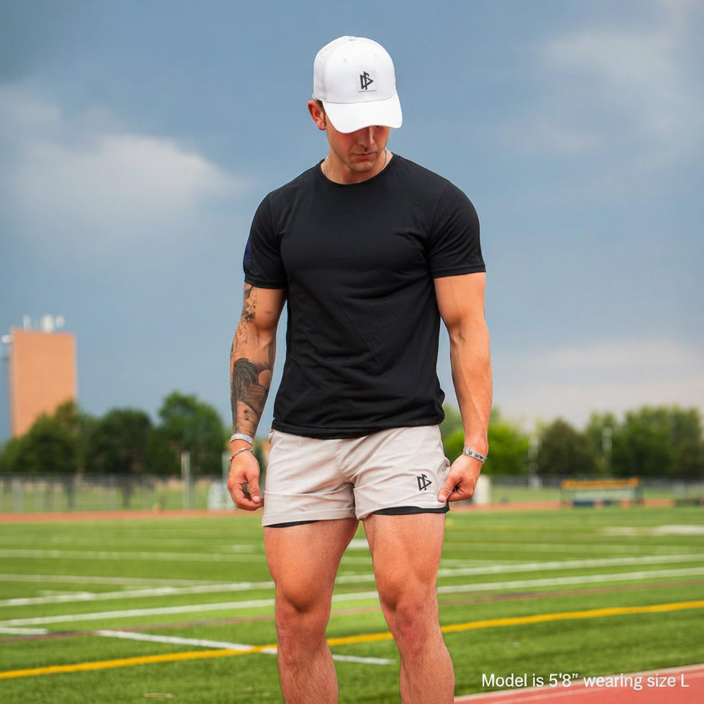 Man wearing Tactical Short in White colorway, lifestyle shot