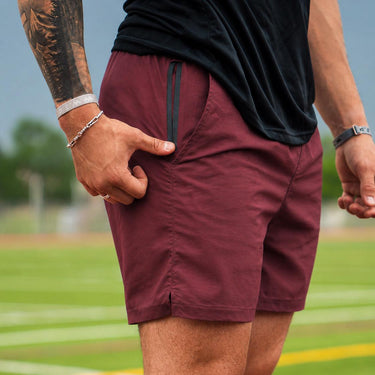Man wearing Tactical Short in Red colorway, full body lifestyle shot