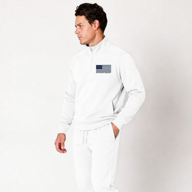 White Blue Line quarter zip pullover worn by a model, side view