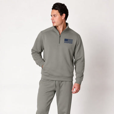 Dark gray Blue Line quarter zip pullover worn by a model, full front view