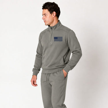 Dark gray Blue Line quarter zip pullover worn by a model, side view