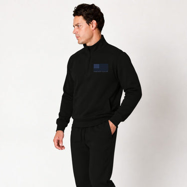 Black Blue Line quarter zip pullover worn by a model, side view