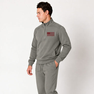 Dark gray Red Line quarter zip pullover worn by a model, front view
