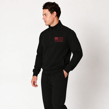 Black Red Line quarter zip pullover worn by a model, front view