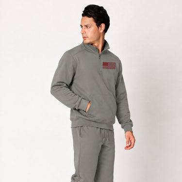 White Red Line quarter zip pullover worn by a model, angled front view