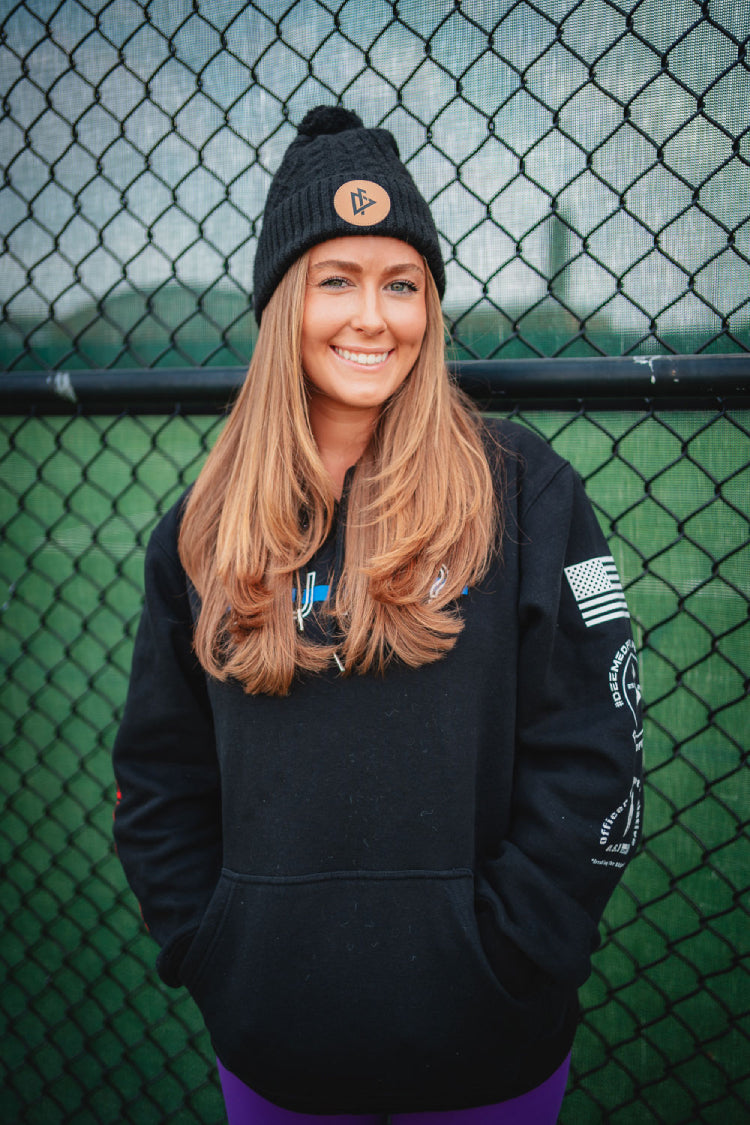 young woman wearing DeemedFit black cotton beanie 