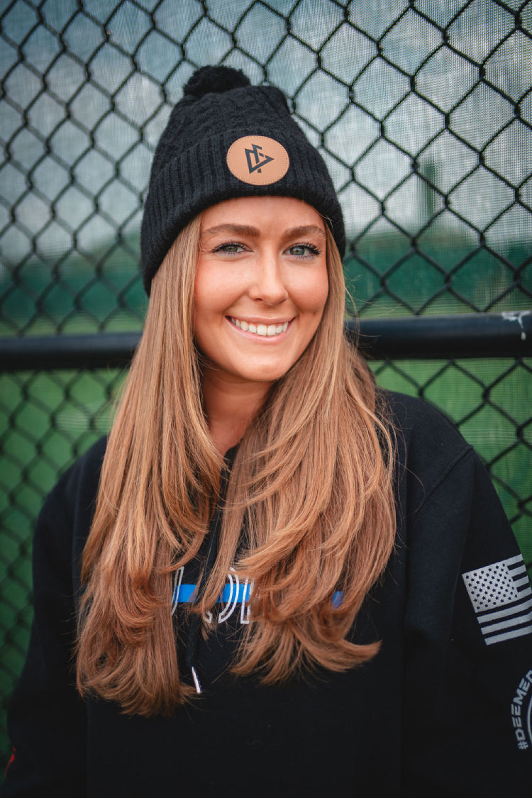 young woman wearing DeemedFit black cotton beanie 