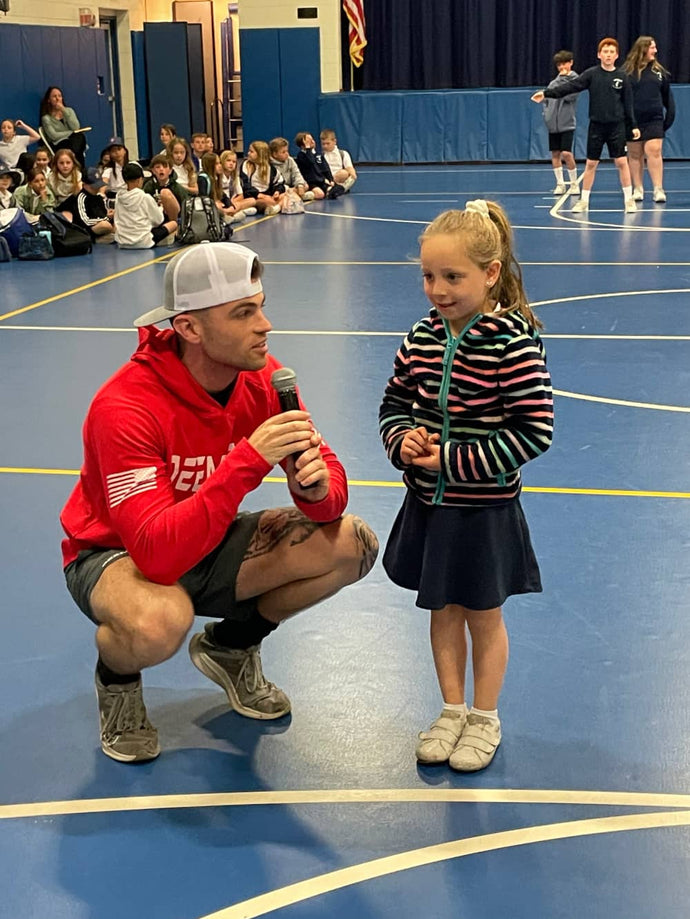 DeemedFit owner with little girl at elementary school