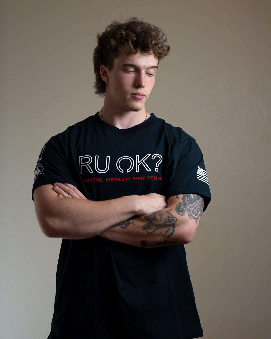 Black t-shirt with 'RU OK?' and 'Mental Health Matters' text on a white background