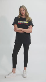 Detail view of the Stigma-Breaking Tee showing detailed Gold Line graphic and comfortable fit.